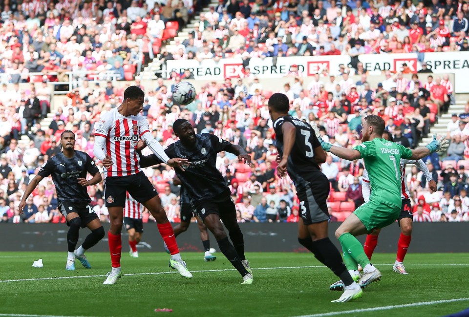 a soccer player with the number 3 on his jersey