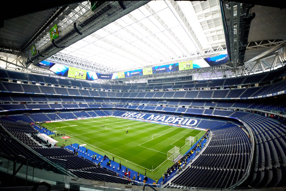 a soccer field with the word real madrid on it