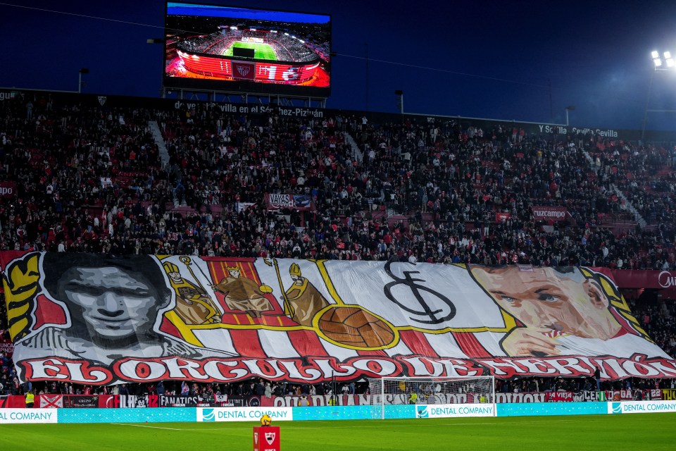 A large banner tribute to Jesús Navas at a Sevilla FC stadium.