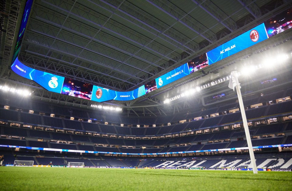 Empty stadium before a Real Madrid and AC Milan soccer match.