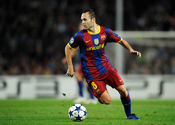 BARCELONA, SPAIN - OCTOBER 20: Andres Iniesta of Barcelona runs with ball during the UEFA Champions League group D match between Barcelona and FC Copenhagen at the Camp nou stadium on October 20, 2010 in Barcelona, Spain. Barcelona won the match 2-0.