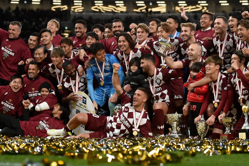 Lukas Podolski #10 (C) celebrates with team mates after the trophy presentation of the 99th Emperor's Cup final between Vissel Kobe and Kashima Ant...