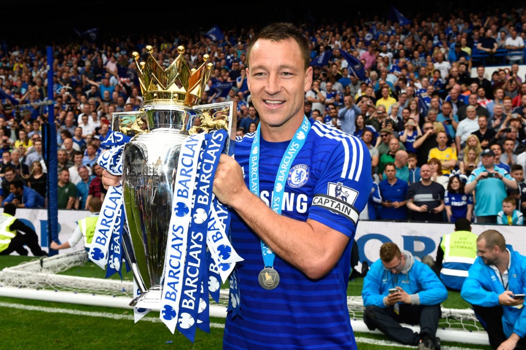 John Terry of Chelsea celebrates with the trophy after the Barclays Premier League match between Chelsea and Sunderland at Stamford Bridge on May 2...