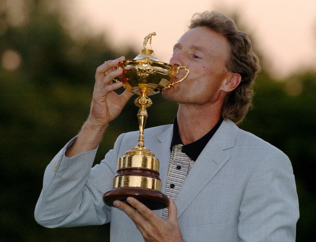 European team captain Bernhard Langer kisses the Ryder Cup 19 September, 2004 at Oakland Hills Country Club in Bloomfield Township, Michigan the si...