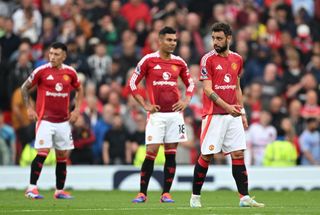 Manchester United squad for 2024/25 MANCHESTER, ENGLAND - SEPTEMBER 01: Bruno Fernandes and Casemiro of Manchester United show dejection, after Luis Diaz of Liverpool (not pictured) scores his team's second goal during the Premier League match between Manchester United FC and Liverpool FC at Old Trafford on September 01, 2024 in Manchester, England. (Photo by Michael Regan/Getty Images)