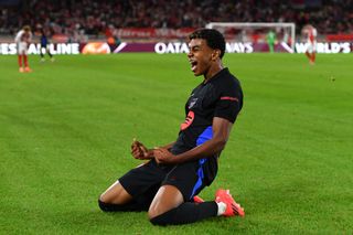 Lamine Yamal of FC Barcelona celebrates scoring his team's first goal during the UEFA Champions League 2024/25 League Phase MD1 match between AS Monaco and FC Barcelona at Stade Louis II on September 19, 2024 in Monaco, Monaco. Arsenal