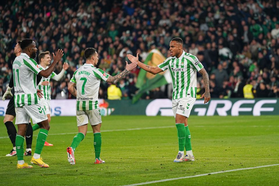 Real Betis players celebrating a goal.