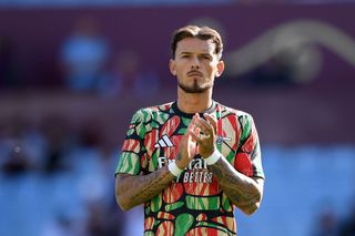 Ben White of Arsenal acknowledges the fans during the warm up prior to the Premier League match between Aston Villa FC and Arsenal FC at Villa Park on August 24, 2024 in Birmingham, England.