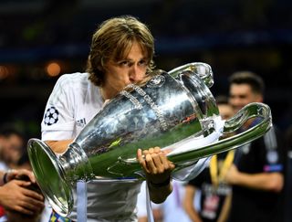 Luka Modric kisses the Champions League trophy after Real Madrid's win over Atletico Madrid on penalties in the 2016 final.