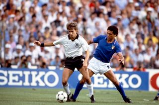 11 July 1982 Fifa World Cup Final - Italy v West Germany - Pierre Littbarski of West Germany shields the ball away from Claudio Gentile of Italy. (Photo by Mark Leech/Getty Images)