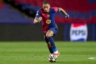 BARCELONA, SPAIN - MARCH 11: Raphinha of FC Barcelona in action during the UEFA Champions League 2024/25 UEFA Champions League 2024/25 Round of 16 Second Leg match between FC Barcelona and SL Benfica at on March 11, 2025 in Barcelona, Spain. (Photo by Aitor Alcalde/Getty Images)