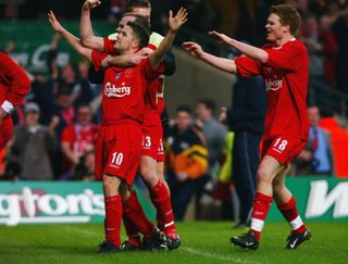 Michael Owen celebrates with his team-mates after scoring for Liverpool in the 2003 League Cup final.