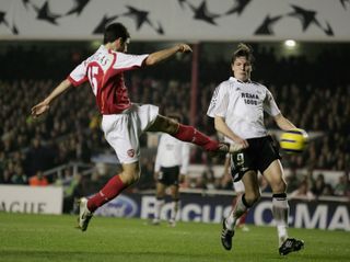 Cesc Fabregas scores for Arsenal against Rosenborg in the Champions League in December 2004.