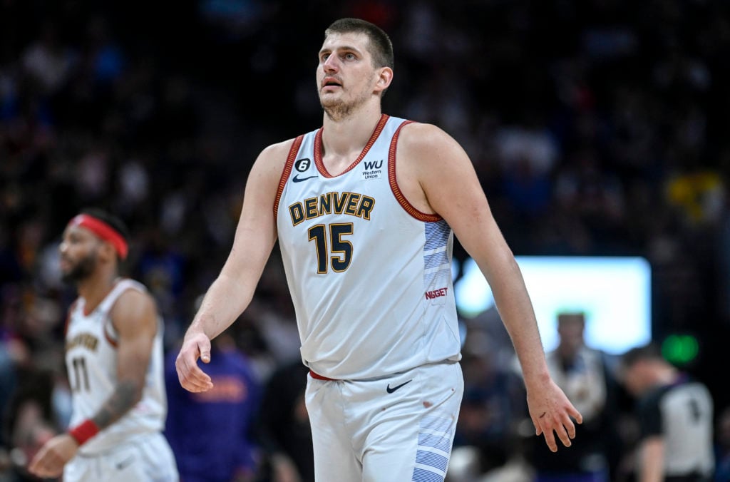 Nikola Jokic (15) of the Denver Nuggets reacts to a turnover by the offense during the second quarter against the Phoenix Suns at Ball Arena in Den...