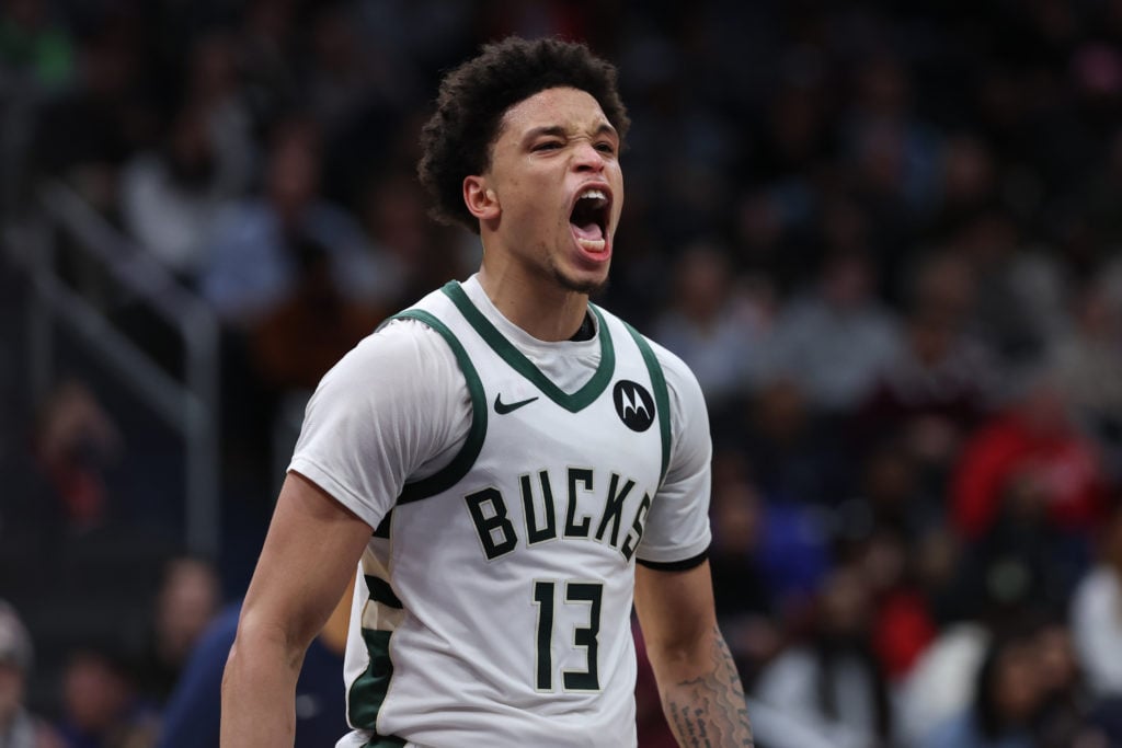 Ryan Rollins #13 of the Milwaukee Bucks celebrates against the Washington Wizards during the second half at Capital One Arena on February 21, 2025 ...