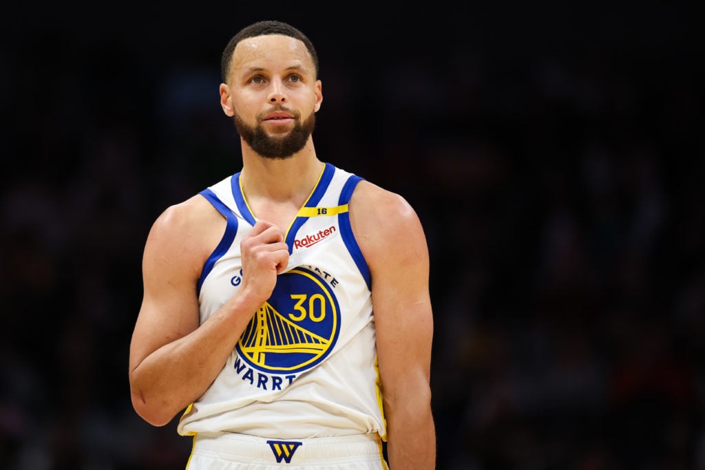 Stephen Curry #30 of the Golden State Warriors looks on during the second half of a basketball game against the Charlotte Hornets at Spectrum Cente...