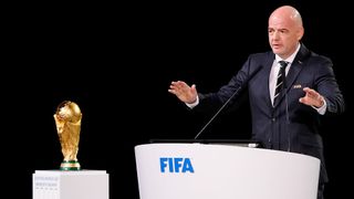 FIFA president Gianni Infantino with the World Cup trophy