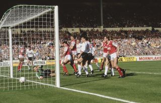 Charlie Nicholas (next to post) scores for Arsenal against Liverpool in the 1987 League Cup final.