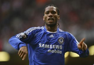 Didier Drogba celebrates his second goal for Chelsea against Arsenal in the 2007 League Cup final.