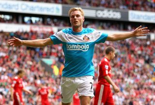 Sebastian Larsson celebrates after scoring for Sunderland against Liverpool in the Premier League in August 2011.