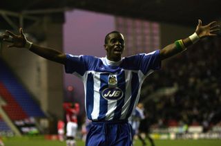 Henri Camara celebrates after scoring for Wigan Athletic against Charlton Athletic in December 2005.