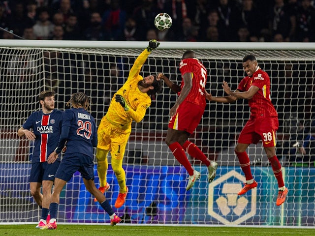 Alisson Becker of Liverpool makes a save against Paris Saint-Germain, on March 5, 2025