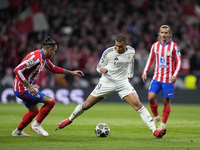 Atletico Madrid's Jose Gimenez in action against Real Madrid's Kylian Mbappe on March 12, 2025