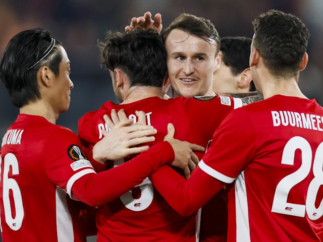 AZ Alkmaar players celebrate a goal against Tottenham Hotspur on March 6, 2025