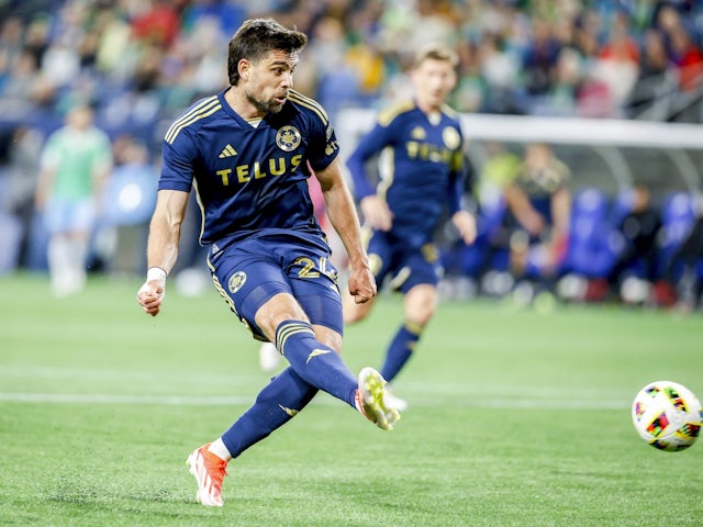 Vancouver Whitecaps forward Brian White scores a goal on April 20, 2024