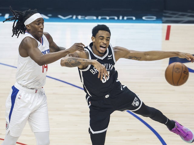 Terance Mann and Nic Claxton in action for Clippers and Nets respectively on October 7, 2024