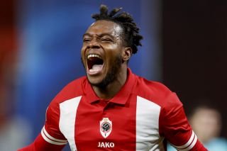 George Ilenikhena celebrates after scoring for Royal Antwerp against Barcelona in the Champions League in December 2023.