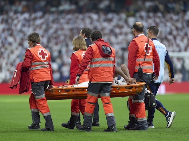 Real Madrid defender Eder Militao is stretchered off on November 9, 2024