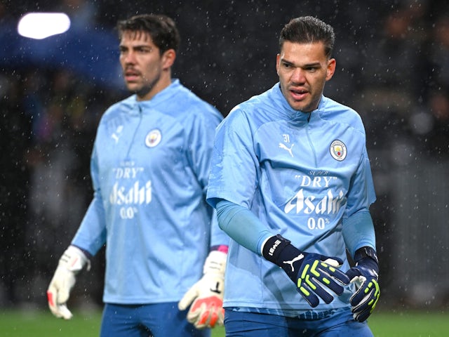 Manchester City's Ederson and Stefan Ortega warming up on October 25, 2023