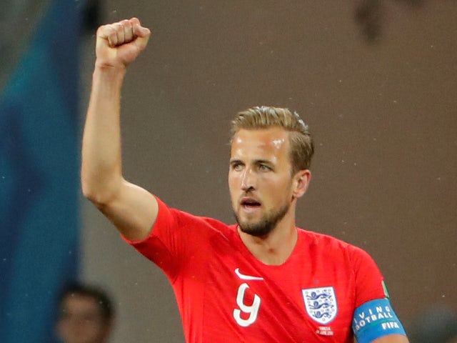 England's Harry Kane celebrates scoring their first goal in the World Cup match against Tunisia on June 18, 2018