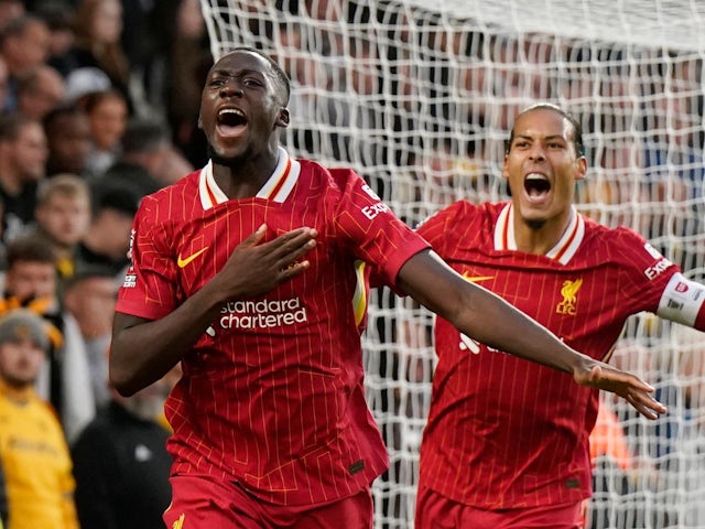 Liverpool's Ibrahim Konate celebrates with Virgil van Dijk on September 28, 2024