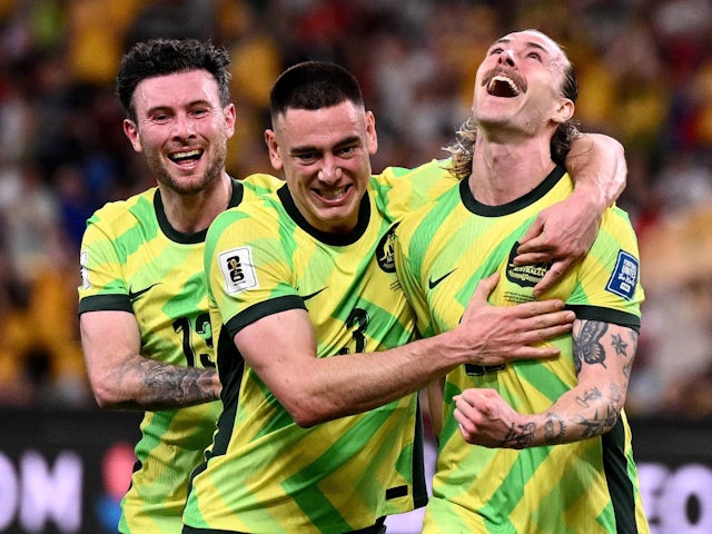 Australia's Jackson Irvine celebrates with teammates on March 20, 2025