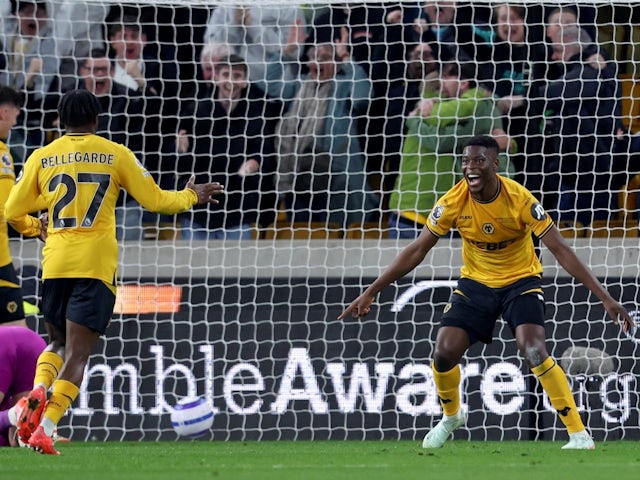 Jean-Ricner Bellegarde and Marshall Munetsi of Wolverhampton Wanderers celebrate equalising against Everton, on March 8, 2025