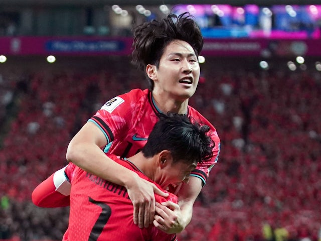 Lee Kang-in of South Korea celebrates with Son Heung-min on June 11, 2024