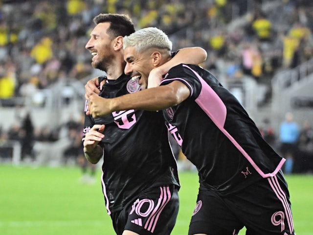 Inter Miami's Lionel Messi and Luis Suarez celebrate on October 2, 2024