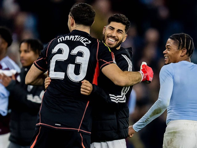 Aston Villa's Marco Asensio celebrates with Emiliano Martinez on February 28, 2025