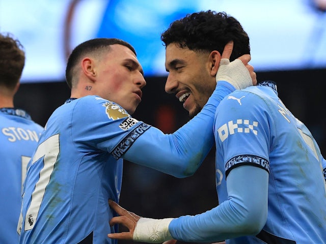 Manchester City's Phil Foden and Omar Marmoush celebrate on February 15, 2025