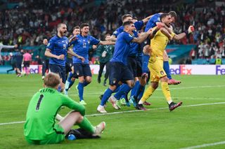 Gianluigi Donnarumma celebrates with his team-mates after Italy's win over England on penalties against England in the final of Euro 2020.