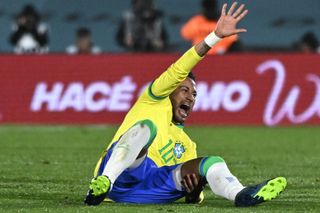 Neymar reacts after suffering a serious injury playing for Brazil against Uruguay in October 2023.