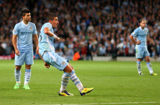 Aleksandar Kolarov scores for Manchester City against Napoli in the Champions League in September 2011.