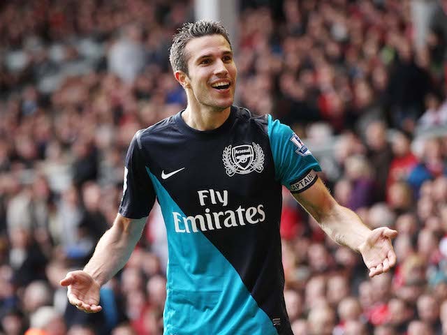 Robin van Persie celebrates scoring for Arsenal in 2012