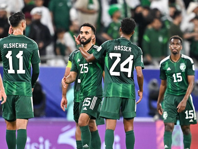 Saudi Arabia's Mohammed Al Burayk with teammates on January 25, 2024