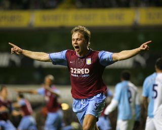 Martin Laursen celebrates after scoring for Aston Villa against Tottenham at White Hart Lane in October 2007.