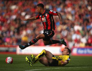 Bournemouth's Joshua King evades a challenge from Watford's Craig Cathcart during a game in October 2015.