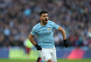 Sergio Aguero celebrates after scoring for Manchester City against Arsenal in the 2018 League Cup final.