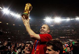 Andres Iniesta of Spain holds the World Cup, 2010